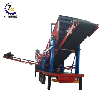 Tractor track wheel mounted jaw crusher