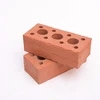 Red perforated clay bricks for construction