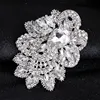 Latest trendy beautiful design handmade charm crystal holding flower brooch
