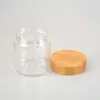 /product-detail/new-arrival-with-wooden-cosmetic-plastic-glass-jar-lid-and-spoon-62050207678.html