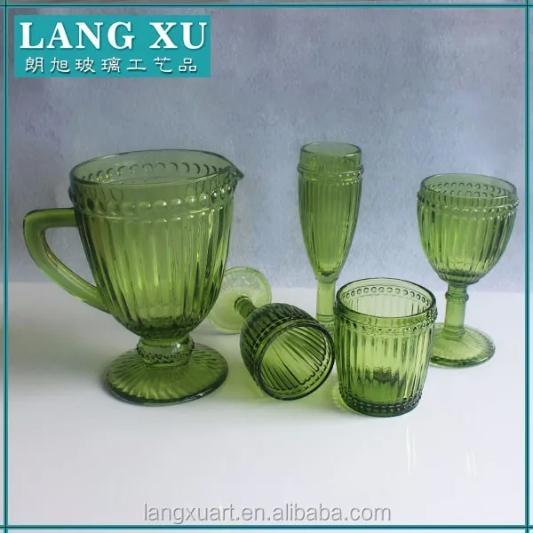 beautiful dot rimmed green colored wine glass water glass