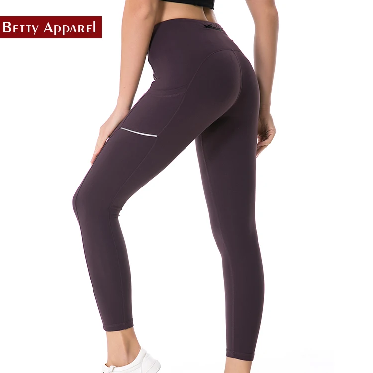 Women custom nylon spandex high waisted yoga pants with pockets, Side pockets in leggings
Women custom nylon spandex high waisted yoga pants with pockets, Side pockets in leggings