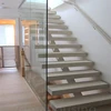 residential stainless steel beam stairs with walnut stairs tread