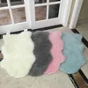 /product-detail/artificial-sheepskin-animal-shape-carpet-fur-in-one-body-imitation-wool-floor-mat-60682556109.html