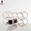 /product-detail/cheap-modern-iron-standing-copper-wire-wine-rack-60779078847.html