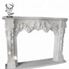 Flower carved white marble fireplace surround