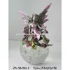 Baby fairy figurines with flower on glass ball, pewter color with hand painting