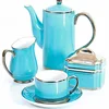 blue large tea pot and cups with silver plated handle and rim