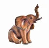/product-detail/popular-resin-handcrafted-unique-wooden-style-elegant-elephant-figurine-60799758522.html