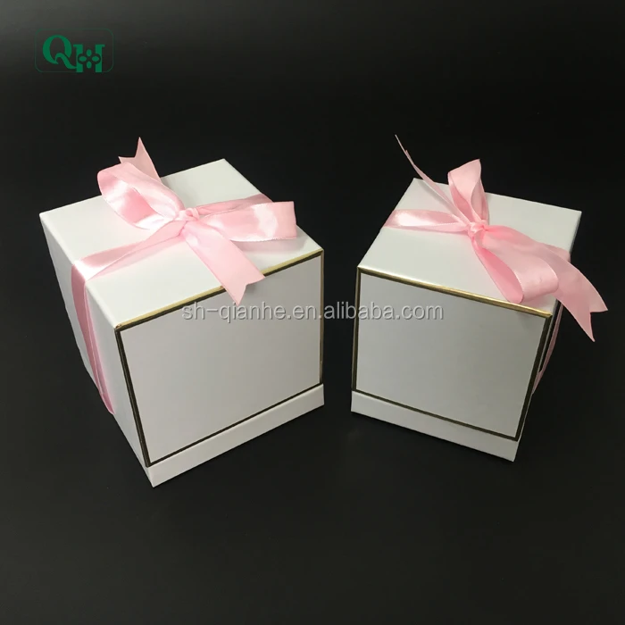 white cardboard perfume packaging boxes
