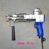 Hand tufting gun for carpets