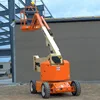 Articulating boom vehicle lift, articulating table telescopic boom lift