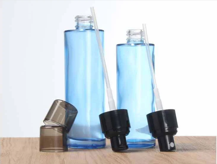 Wholesale 30ml 50ml 100ml transparent blue color Cosmetic packing bottle set bottle cream container for luxury skin care