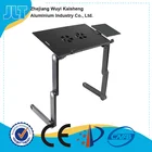 Portable and adjustable standing laptop desk on the bed