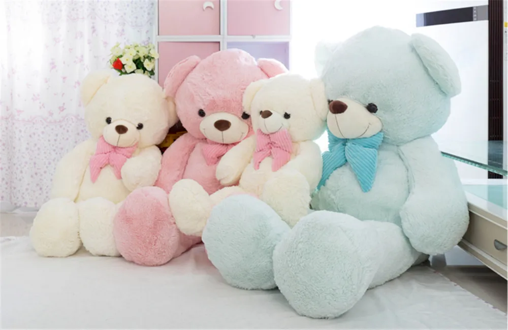 white and blue teddy bear