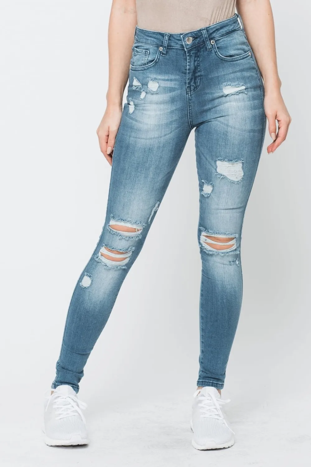 ripped jeans with material underneath