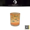 orange colored fish shaped votive glass candle holder votive glass