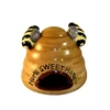 Funny ceramic Bee hive decorations in home