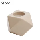 Cheap and bulk polygonal shaped 3 inch tealight christmas ceramic decorative candle holder
