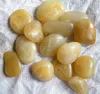 yellow polished pebbles smooth pebble stone