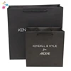 Luxury Folding Solid Black Kraft Shopping Paper Bag For Garment Packing