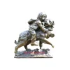 /product-detail/high-quality-metal-material-bronze-sculpture-small-boy-riding-on-a-dog-60833521408.html