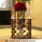 Scale base round gold stainless steel dining table with glass