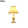 Hot sales modern European style fabric lamp shade antique brass luxurious gift parlour LED resin table lamp