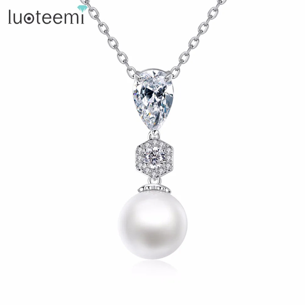 LUOTEEMI Pearl-Shaped Cubic Zirconia Wedding Pendant Necklace for Women Brides with Simulated White Pearl Drops Necklace
LUOTEEMI Pearl-Shaped Cubic Zirconia Wedding Pendant Necklace for Women Brides with Simulated White Pearl Drops Necklace