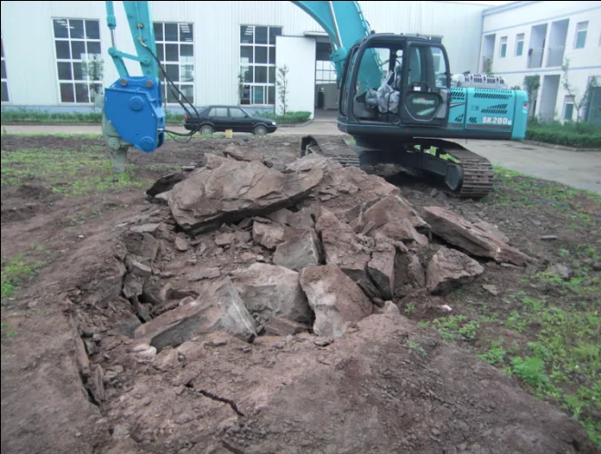 20 ton excavator used vibro hammer ripper to break rock