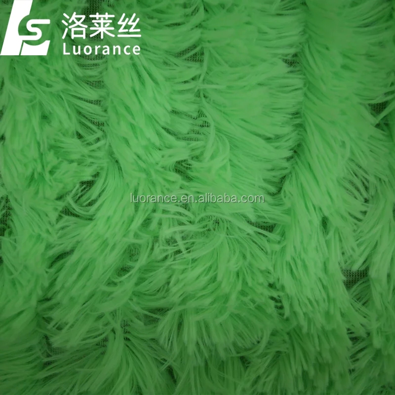 green faux fur fabric.png