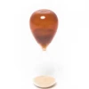 Colorful hourglass sand timer make coffee
