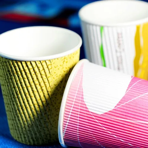 Disposable ripple wall paper cup with lid