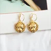 wholesale 2019 latest design hyperbolic statement jewelry women huggie earrings gold metal lion head drop hoop earrings