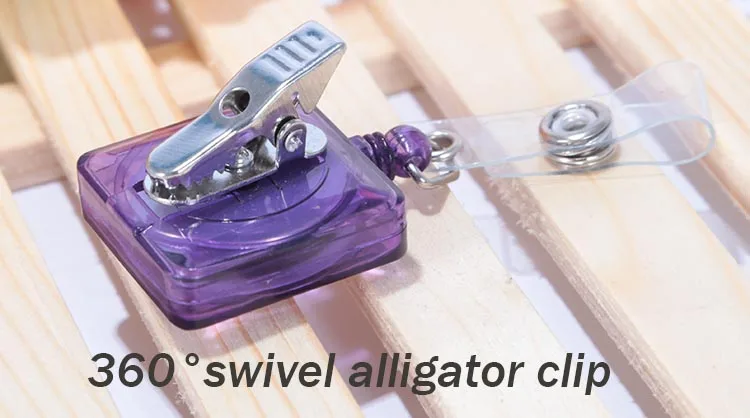 Badge reel with alligator clip