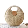 Wholesale women summer natural raffia straw bag shell shape rattan straw beach tote hand bag
