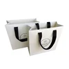 Low Cost Ribbon Handle White Gift Carrier Packaging Custom Logo Print Design Luxury Paper Shopping Bag