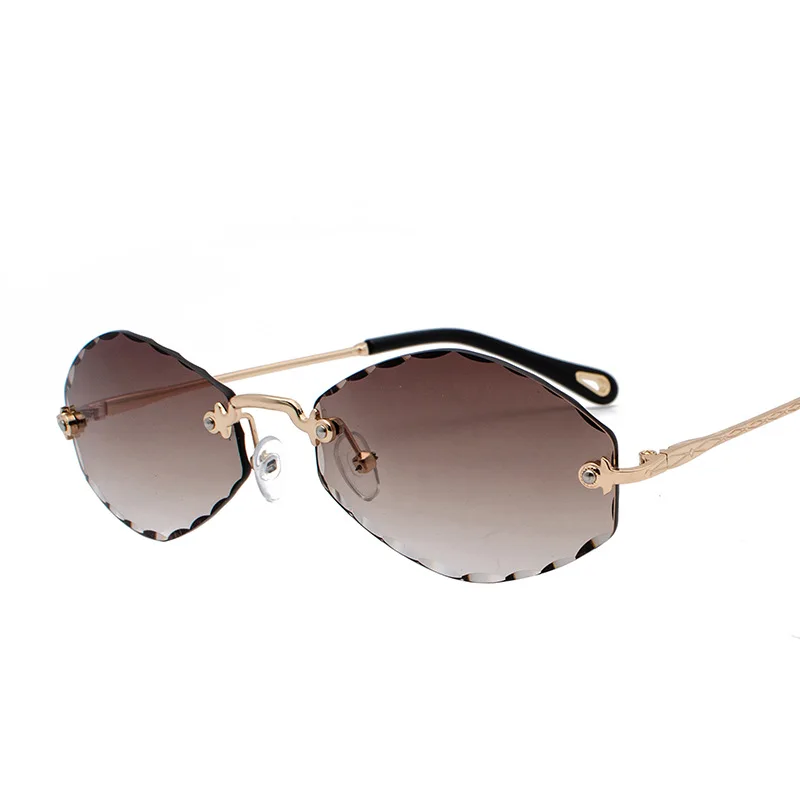Fashion brand design cutting lens sun shades women rimless eyewear custom logo wholesale sunglasses
Fashion brand design cutting lens sun shades women rimless eyewear custom logo wholesale sunglasses
