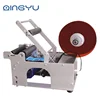 The MT-50 Semi-Automatic small round bottle sticker labeling machine