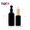 Wholesale 10ml 15ml 50ml 100ml black glass bottle essential oil
