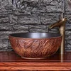 Natural copper color table top face wash basin in stalling in bathroom for hand clean