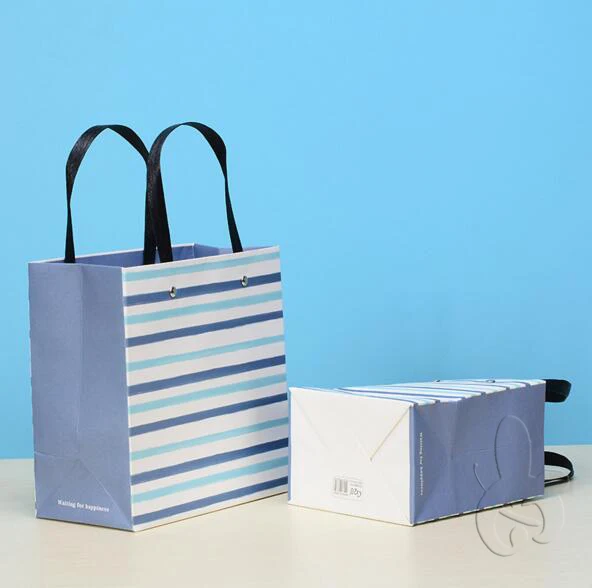 blue and white striped gift paper bag with nylon handles