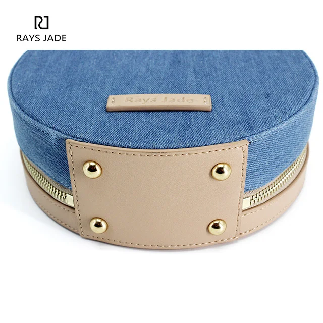 Designer cross-body bag made in denim with plain leather ladies handbags