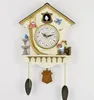 GOGO FASHION Quartz Cuckoo Clock Black Forest house with moving wood chopper and mill wheel, with music