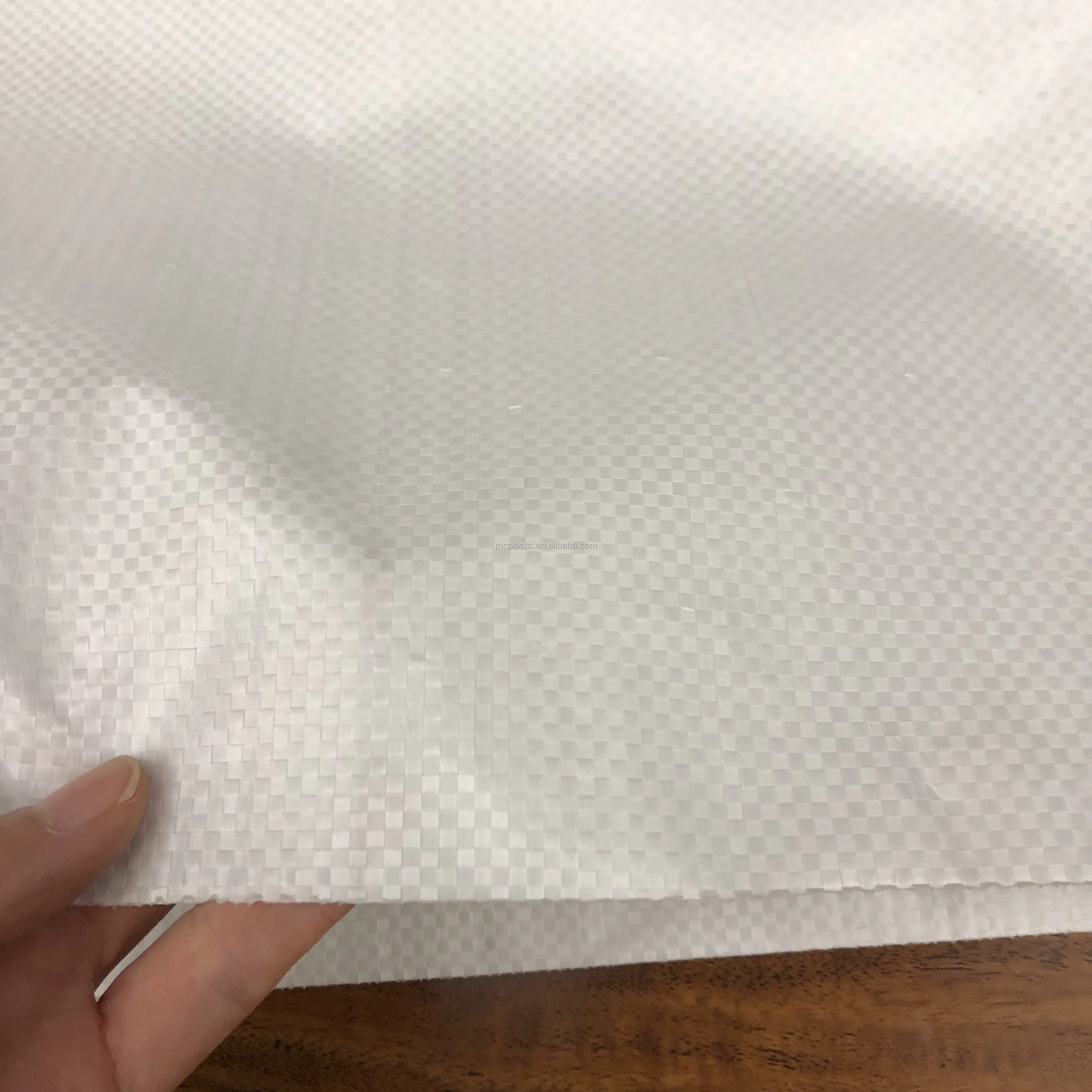 packaging bags   material: 60-80g/sm pp woven fabric width: 22cm