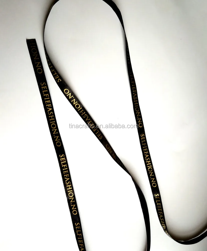 1cm black polyester satin ribbon with gold logo printed, Colourful
1cm black polyester satin ribbon with gold logo printed, Colourful
