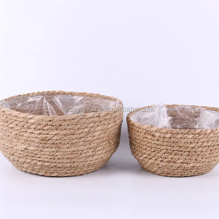 white and grey natural rattan seagrass round plant basket with
