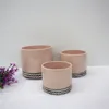 /product-detail/customized-half-glaze-and-half-sandy-matte-ceramic-pot-for-water-plant-60748666162.html