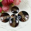 Buttons are sold on top grade resin-striped, flower-shaped, four-eyed button sweaters