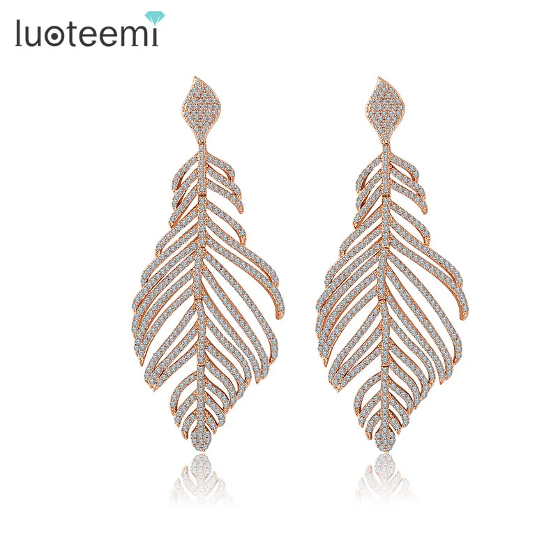 LUOTEEMI Women's Retro Boho White Gold Full CZ Rhinestone Micro Setting Luxury Big Heavy Feather Party Deluxe Dangle Earrings
LUOTEEMI Women's Retro Boho White Gold Full CZ Rhinestone Micro Setting Luxury Big Heavy Feather Party Deluxe Dangle Earrings